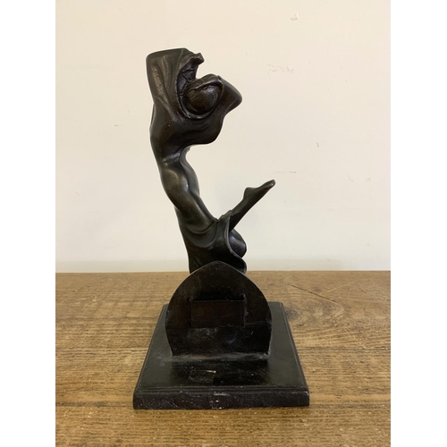 82 - After J B Hirsch, an Art Deco bronze style figurine of a dancer, 10 3/4