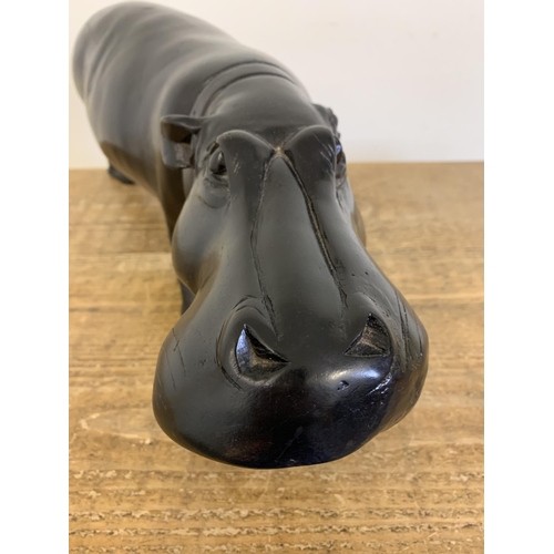 92 - A large and heavy antique carved ebony hippopotamus, approx. 18 3/4