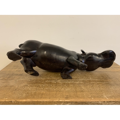 92 - A large and heavy antique carved ebony hippopotamus, approx. 18 3/4