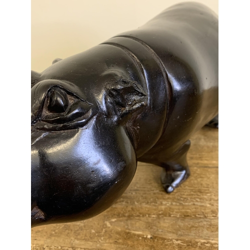 92 - A large and heavy antique carved ebony hippopotamus, approx. 18 3/4