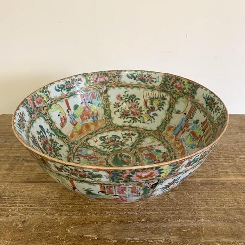 95 - A large antique Chinese canton famille rose punch bowl with all overhand painted decoration, 13