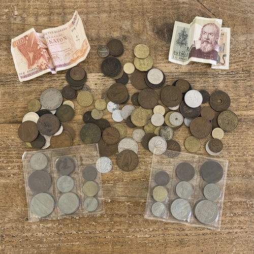 A selection of mixed world and UK coinage plus two banknotes