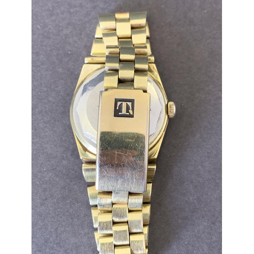 160 - A boxed gold plated Tissot PR516 'GL' wristwatch (winds and ticks)