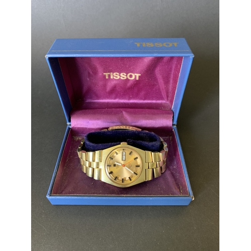 160 - A boxed gold plated Tissot PR516 'GL' wristwatch (winds and ticks)