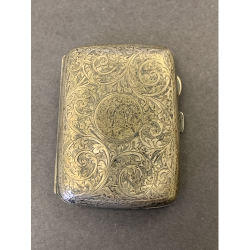 180 - A hallmarked silver cigarette case, weight approx. 47g (dents to case)