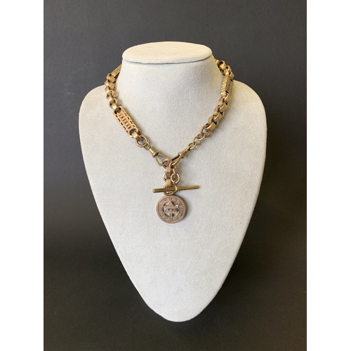 182 - An incredibly chunky antique yellow metal and 9ct gold Albert chain, the round disc is 9ct as are th... 