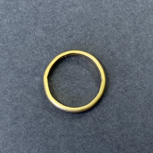 192 - A 22ct gold band, approx. size O, weight approx. 4.5g (ring out of shape and damage to inside of sha... 