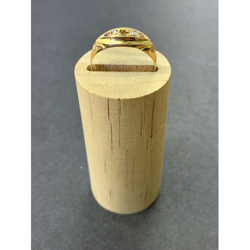 197 - An 18ct gold and stone set ring with diamonds, approx. size S, weight approx. 2.7g (central stone mi... 