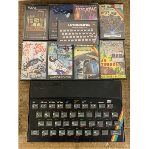 209 - A vintage Sinclair ZX Spectrum together with booklet and games plus a separate ZX Interface 1 (all u... 