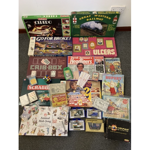 210 - A collection of vintage board games with odd books and jigsaw