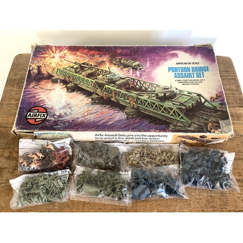 215 - An Airfix Pontoon Bridge Assault set (contents appear complete, mild playwear, box with damage) toge... 