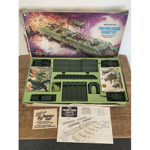 215 - An Airfix Pontoon Bridge Assault set (contents appear complete, mild playwear, box with damage) toge... 