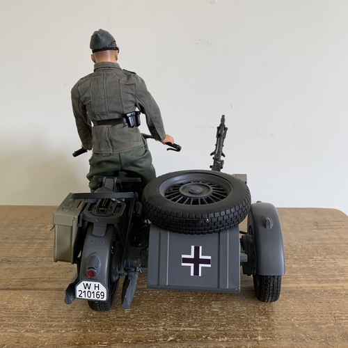 223 - A 21st Century Toys 2000 1/6 scale German WW2 motorcycle with armed sidecar and rider, approx. 14