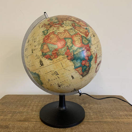 224 - A 1993 'Scan Globe A/S Denmark' illuminated world globe, stands approx. 17