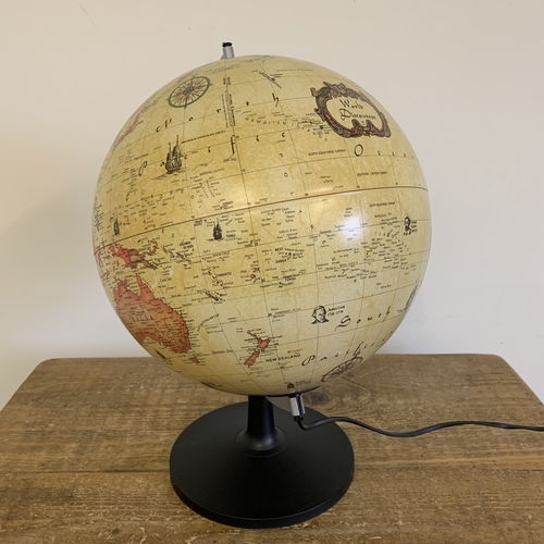 224 - A 1993 'Scan Globe A/S Denmark' illuminated world globe, stands approx. 17