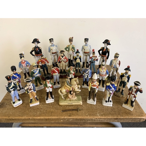 231 - A selection of approx. 25 ceramic and resin 19th Century style military figurines, the tallest just ... 