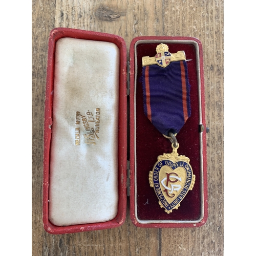 238 - A cased 1918 dated brass and enamel Oddfellows medal plus two Grand Lodge of England collars