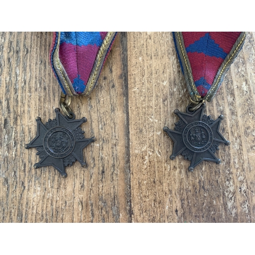 238 - A cased 1918 dated brass and enamel Oddfellows medal plus two Grand Lodge of England collars