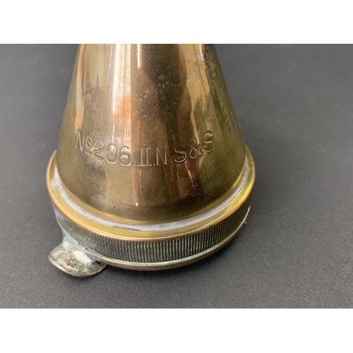 246 - A 1941 dated Trench Art ashtray, the body made from a shell fuse head, this marked No.206.II.N.S&S 7... 