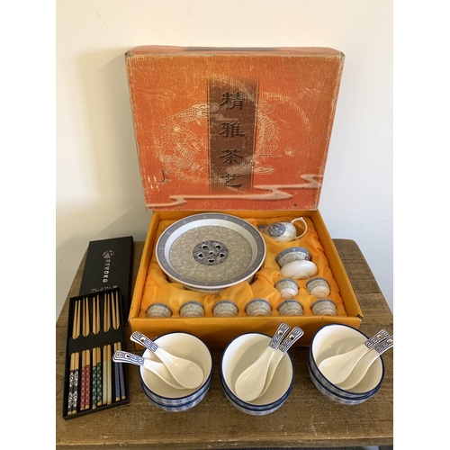 256 - A boxed vintage Chinese ceramic tea set plus six rice bowls, spoons and boxed chop sticks