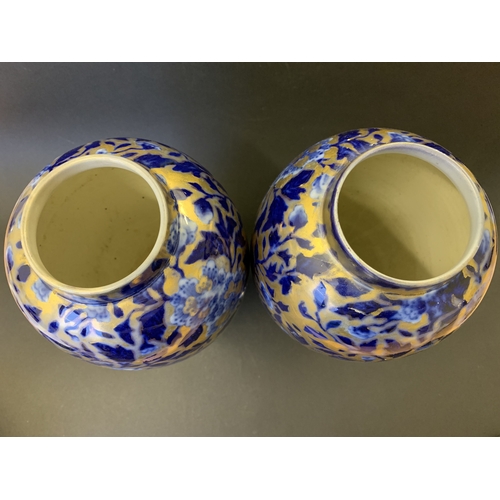 266 - A pair of vintage covered vases decorated in cobalt blue and gilding, no marks to base, approx. 15 3... 