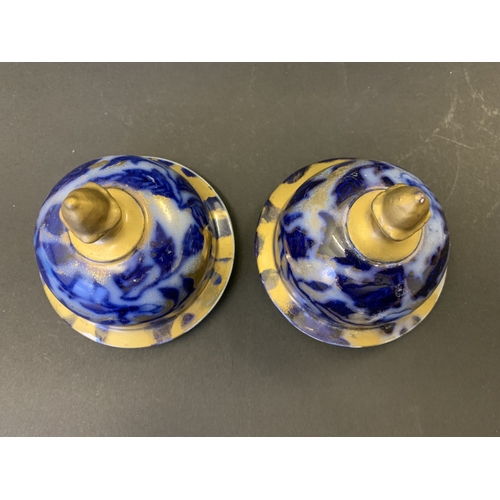 266 - A pair of vintage covered vases decorated in cobalt blue and gilding, no marks to base, approx. 15 3... 