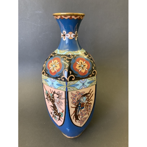 267 - A vintage cloisonne vase decorated with mythical figures, approx. 9 1/4