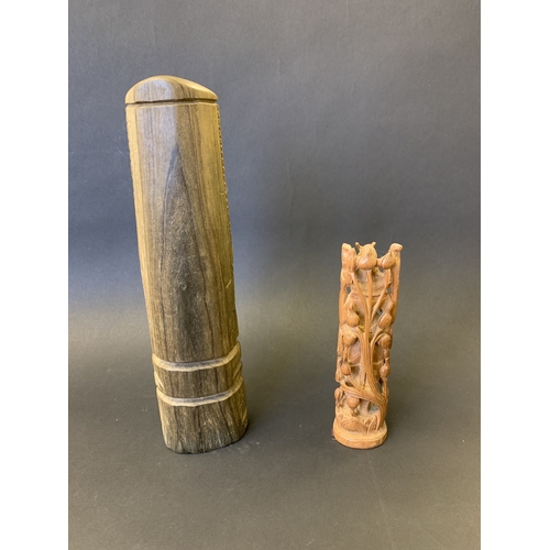 272 - Two small carved wooden ethnic figures, the tallest 9 3/4