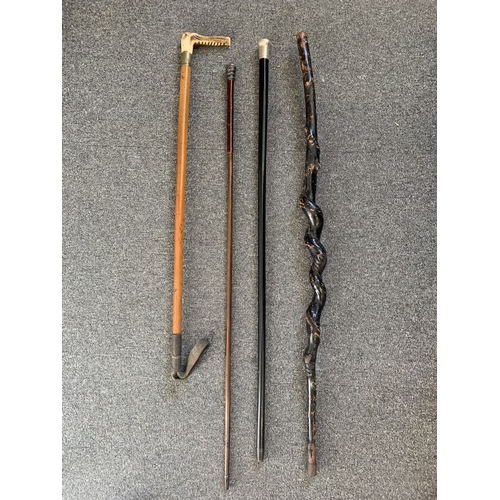 274 - An elegant hallmarked silver top walking cane plus one other (marks very faint), a riding crop and o... 