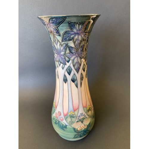 32 - A Moorcroft vase in the 'Cluney' pattern, designed by Sally Tuffin, approx. 12