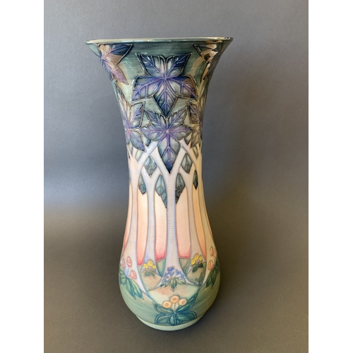 32 - A Moorcroft vase in the 'Cluney' pattern, designed by Sally Tuffin, approx. 12