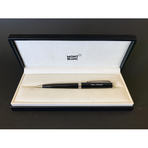 325 - A boxed Mont Blanc MB114797 pen complete with box, warranty card and service guide, the pen had been... 