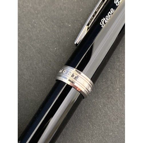 325 - A boxed Mont Blanc MB114797 pen complete with box, warranty card and service guide, the pen had been... 