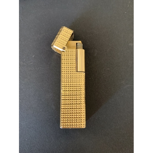 326 - A boxed vintage Colibri London gold finish lighter (signs of use)