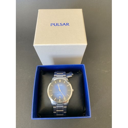 329 - A boxed Pulsar wristwatch, 40mm dia (ticks and runs)