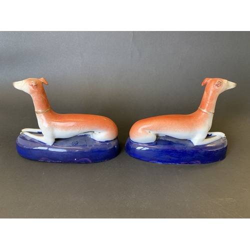 52 - A pair of antique Staffordshire greyhound ink stands (both as found)