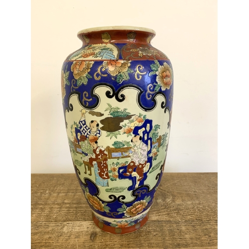 57 - A vintage Oriental hand painted vase, approx. 13 3/4