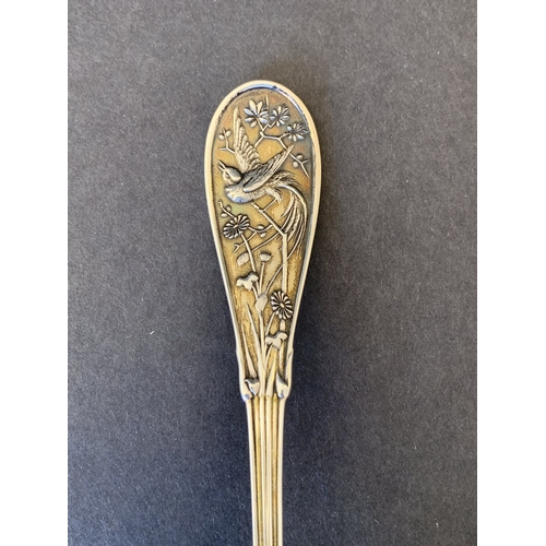 284 - A Tiffany sterling silver small ladle/spoon beautifully decorated in the Japanese pattern with a bir... 