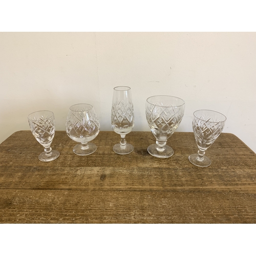 1 - Mixed drinking glasses, some in sets of six including wine glasses (4), champagne flutes (7), sherri... 