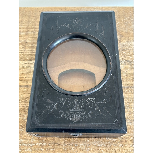 16 - A Victorian ebony veneered stereo-card box viewer (damage to corners)