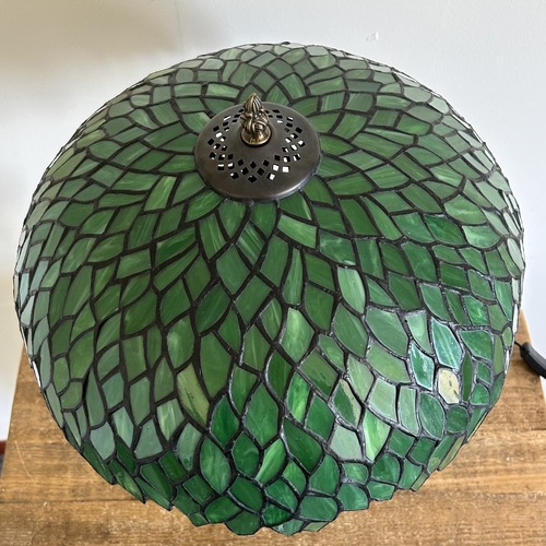 161 - A large size Tiffany style table lamp with green shade and double lamps, approx. 23