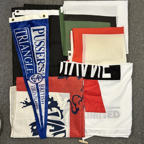 20 - A selection of nylon flags, a silver plated mug with engraved inscription plus another and a selecti... 