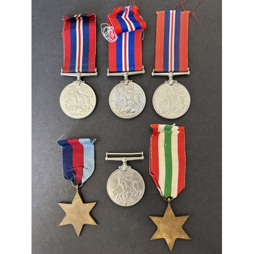 201 - Six WW2 medals including four 1939/45 War medals, 1939/45 Star and Italy Star