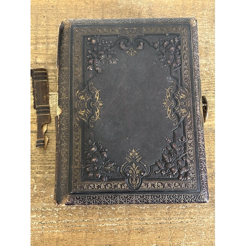 21 - A late Victorian/Edwardian musical photo album with a part selection of pictures, original key, mech... 