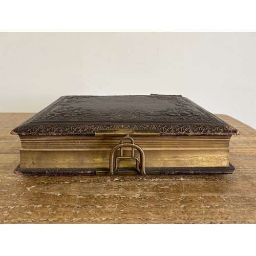 21 - A late Victorian/Edwardian musical photo album with a part selection of pictures, original key, mech... 