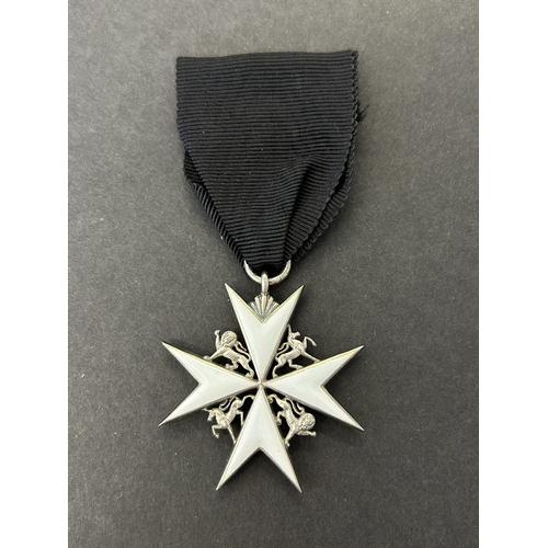 216 - Order of St John serving brothers breast star in case of issue