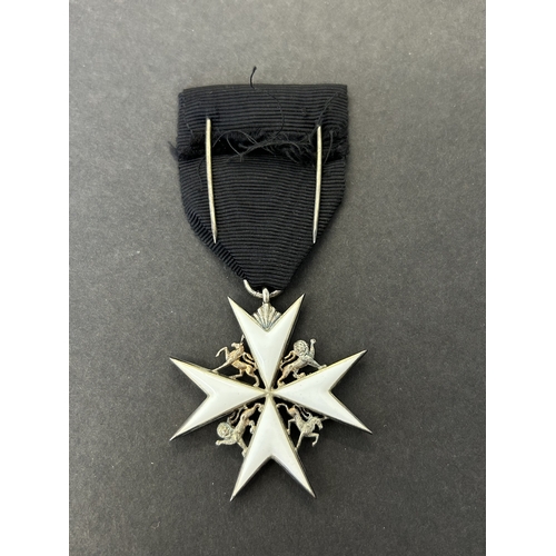 216 - Order of St John serving brothers breast star in case of issue