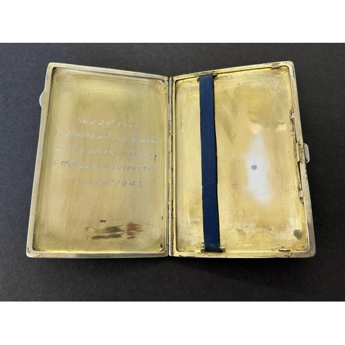 225 - A heavy white metal cigarette case with dated inscription inside, also marked 'Silver' inside plus a... 