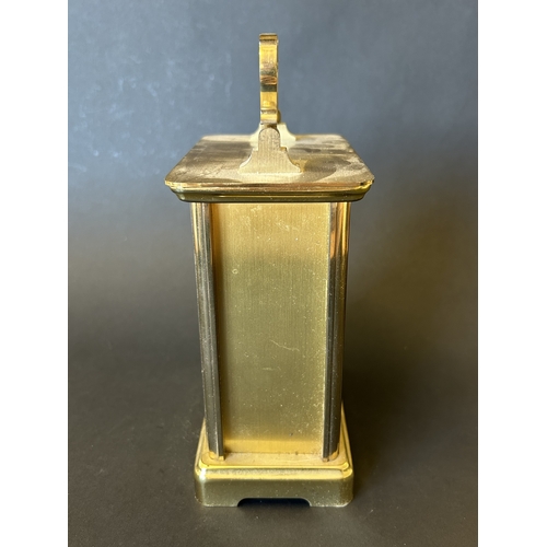 229 - An Acctim battery operated carriage clock in a brass finish, 7 3/4