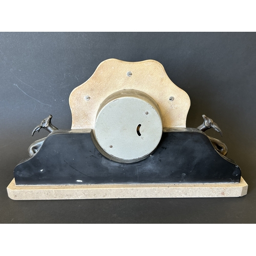 235 - An Art Deco period polished stone with metal leaping deer mantel clock, key wind, approx. 15 1/2